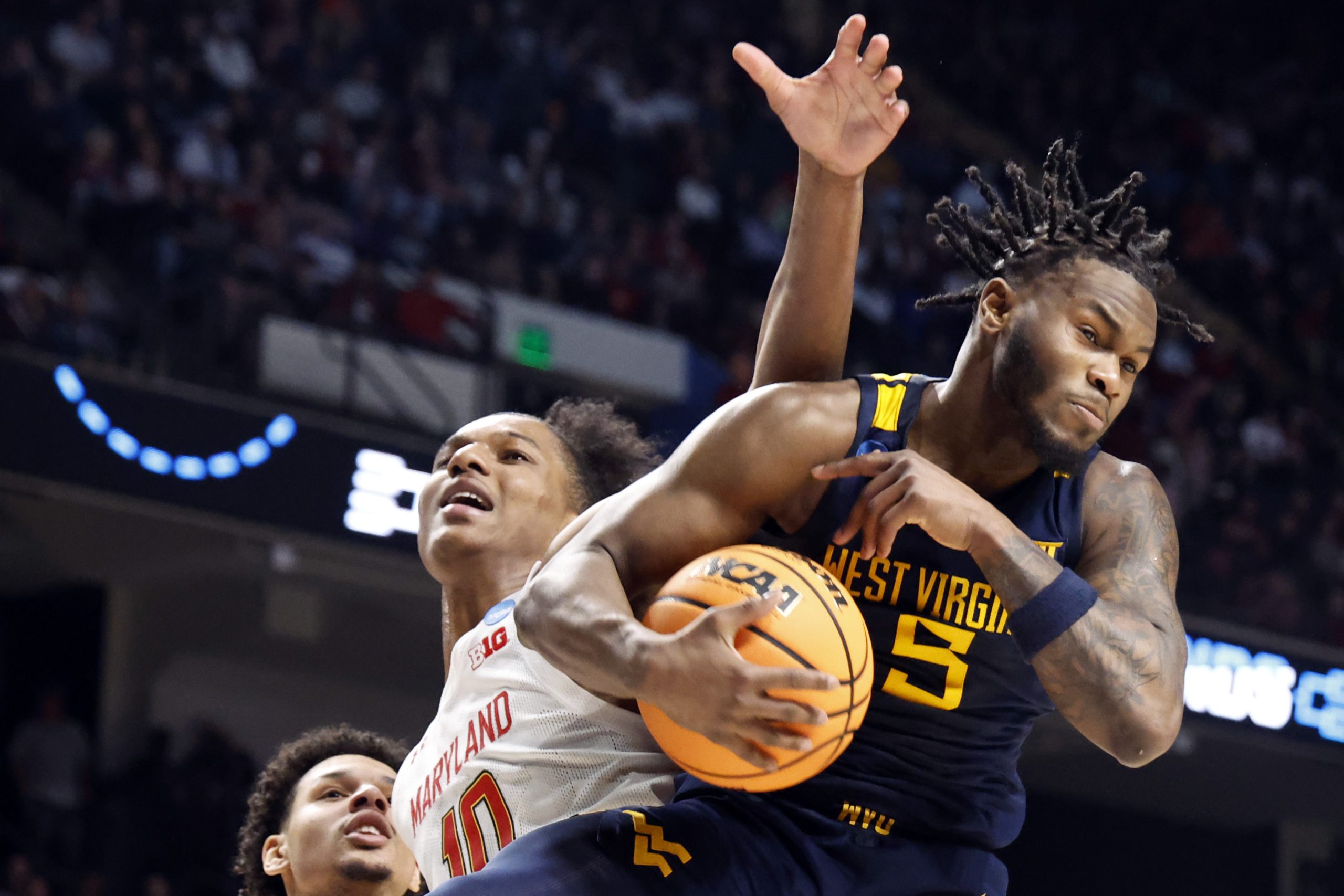 Maryland survives shot at the buzzer, holds off WVU in NCAA tournament